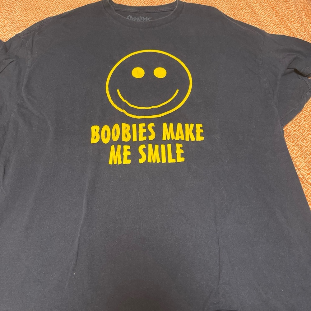 Blue T-Shirt with Yellow Smiley Face Graphic